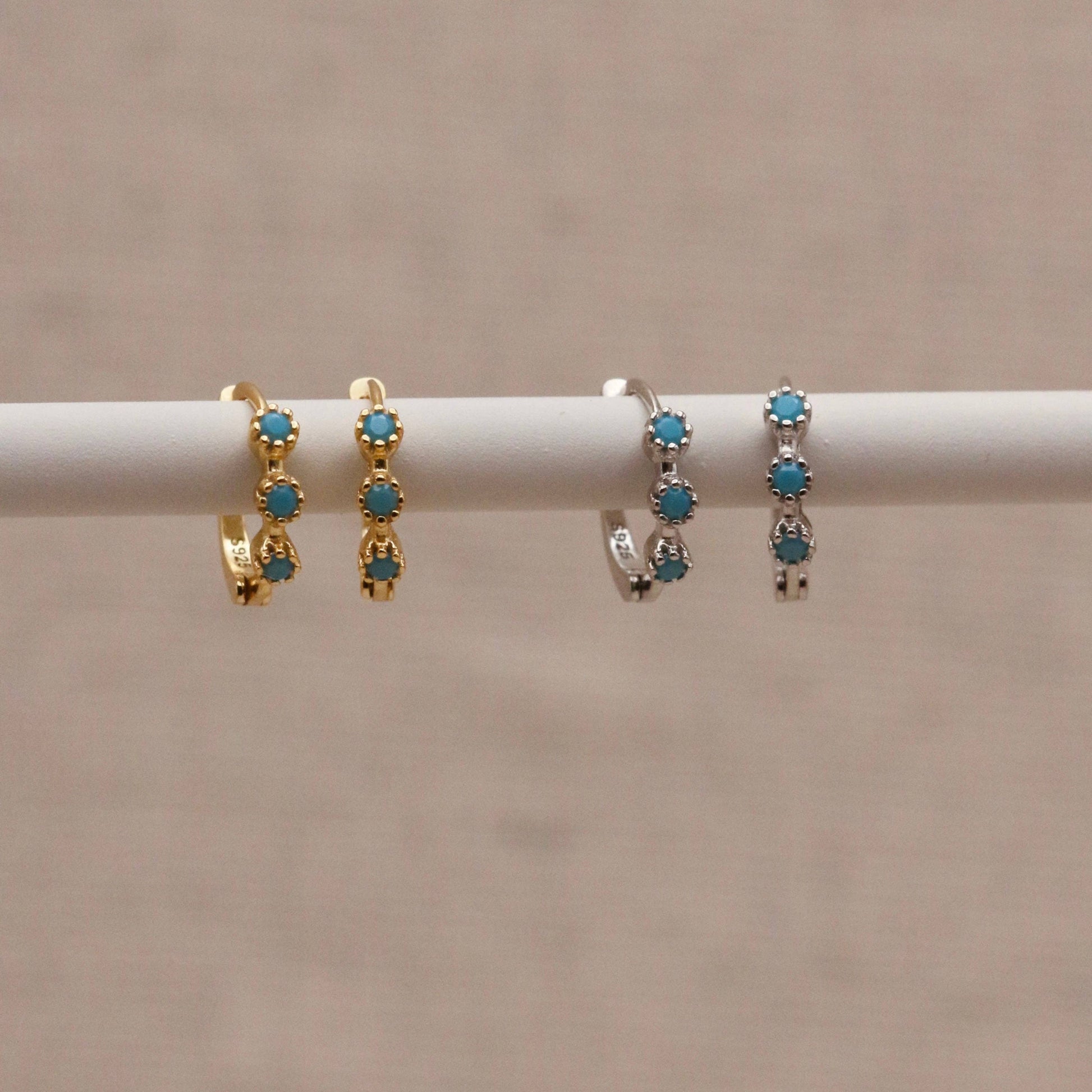 Mini Turquoise Hoops worn in ear
