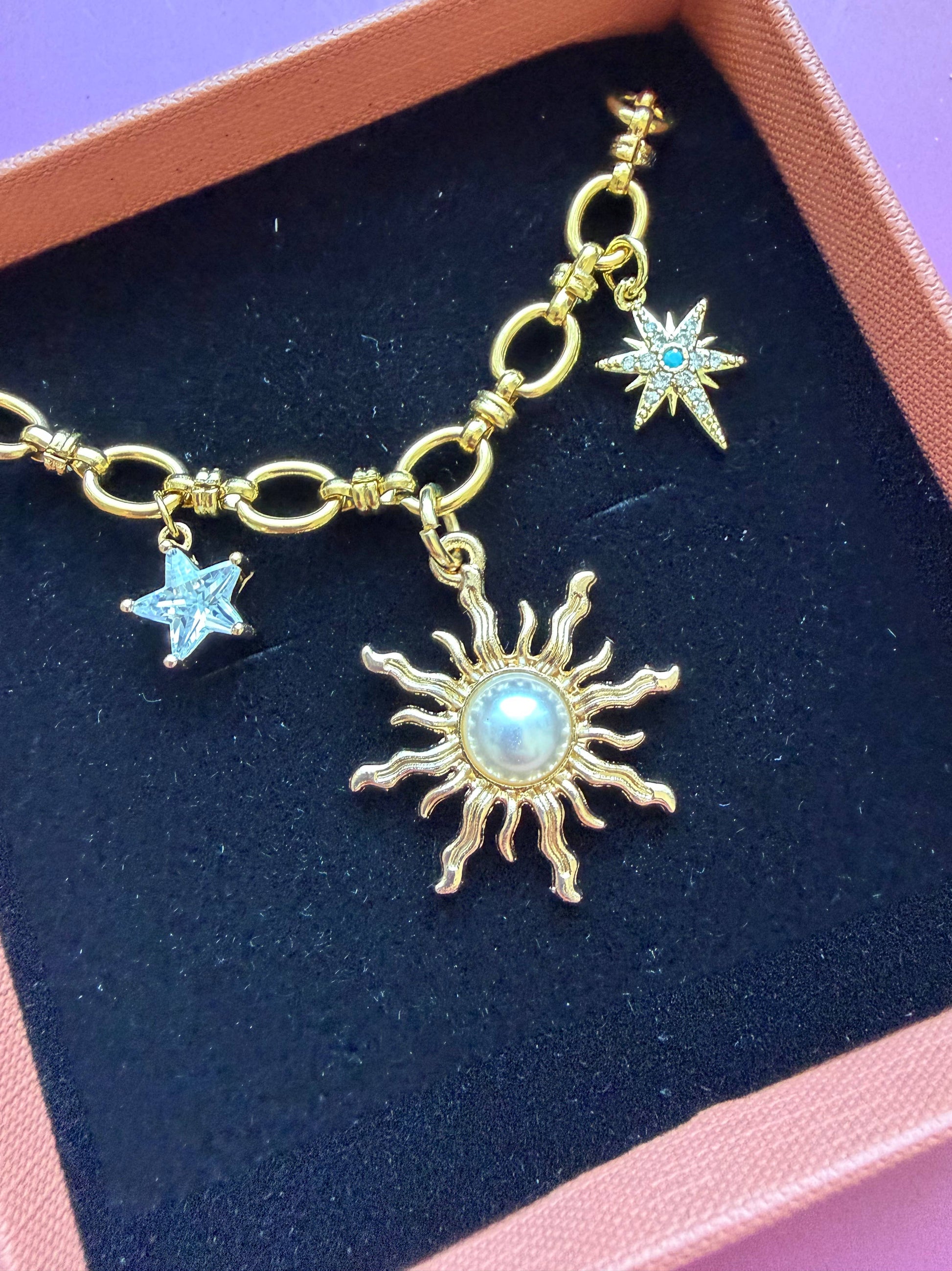 Sustainably packaged gold star charm necklace