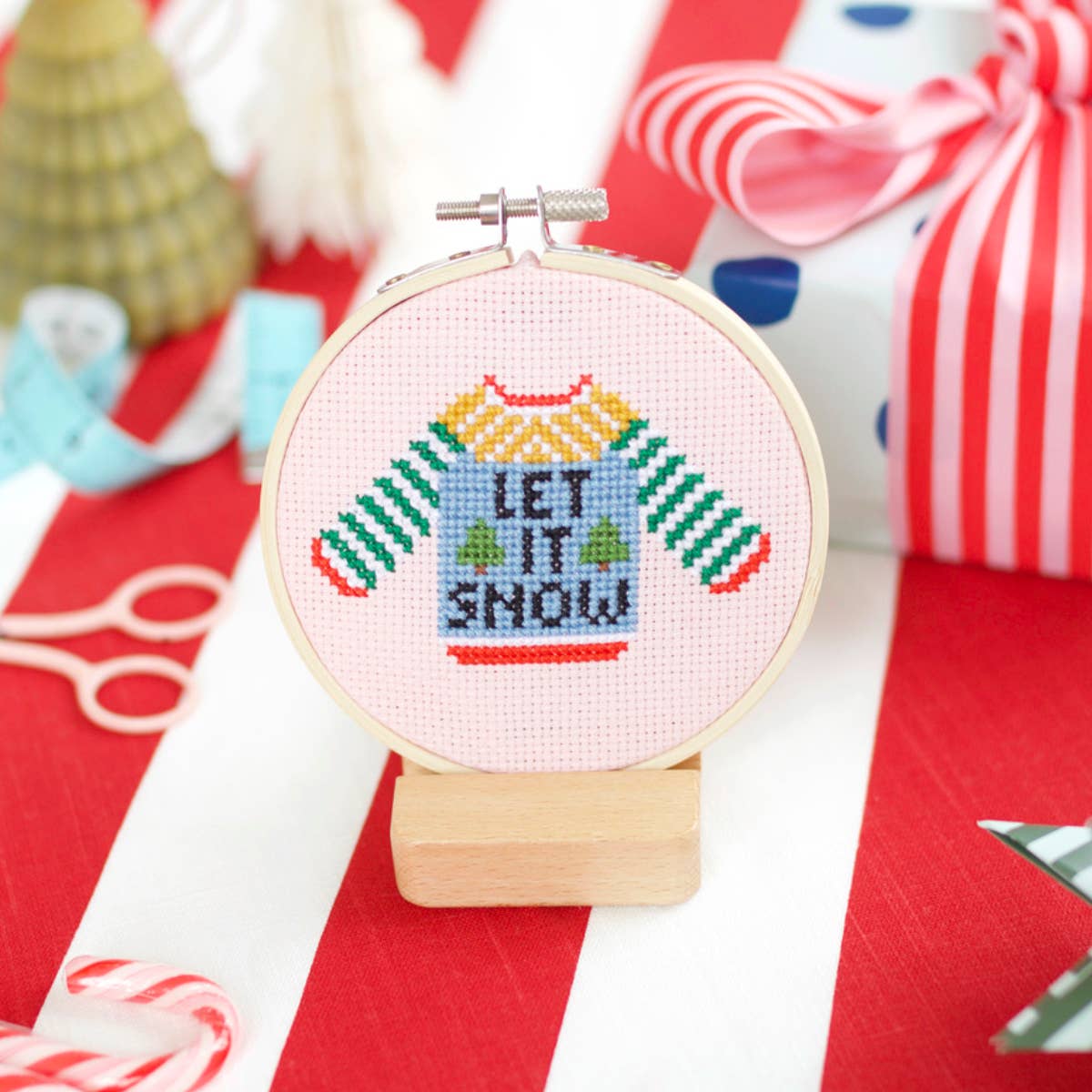 Close-up of the colourful Christmas jumper cross stitch design