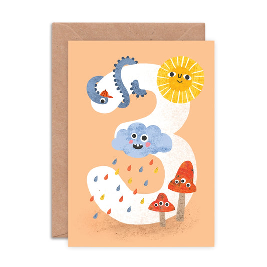 Age 3 birthday card with colourful cloud, sun, and mushroom illustrations on a peach background. Made in the UK.
