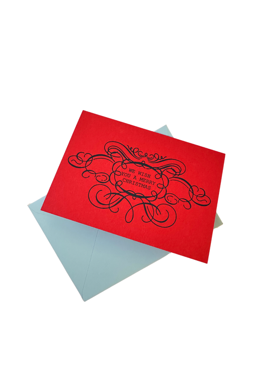 We Wish You a Merry Christmas letterpress red card by Soch and Co.—A6 size, textured, blank inside, with envelope in biodegradable cello packaging.