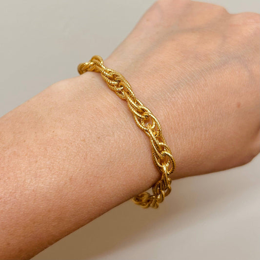 Little Nell Gold Multi-link Bracelet with matte finish, styled on wrist