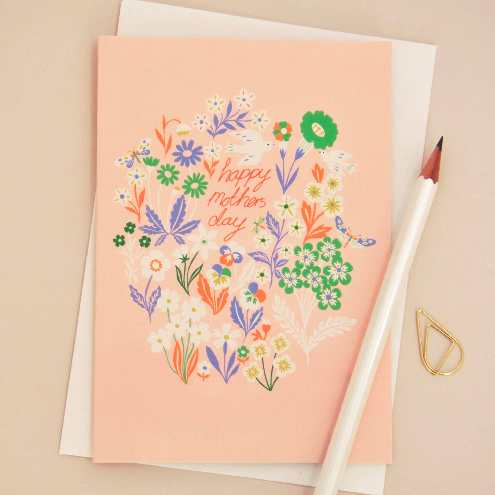 Illustrated Mother’s Day Card featuring meadow flowers, birds and butterflies on creamy pink background