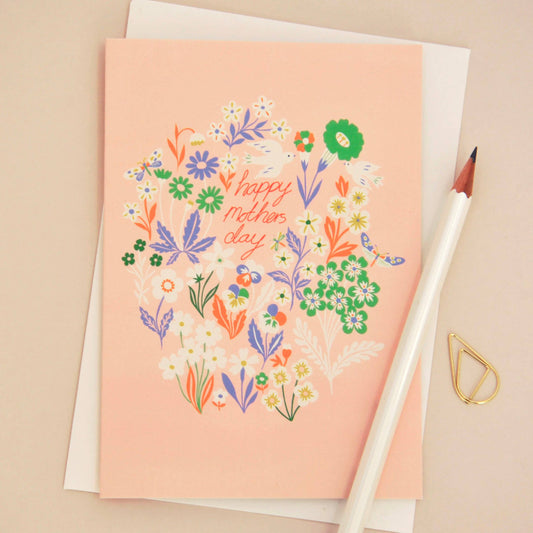 Illustrated Mother’s Day Card featuring meadow flowers, birds and butterflies on creamy pink background