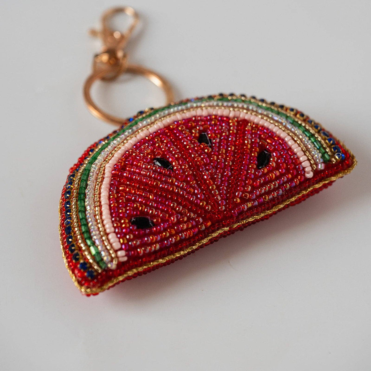 Green bird hand-beaded keyring with brass attachment
