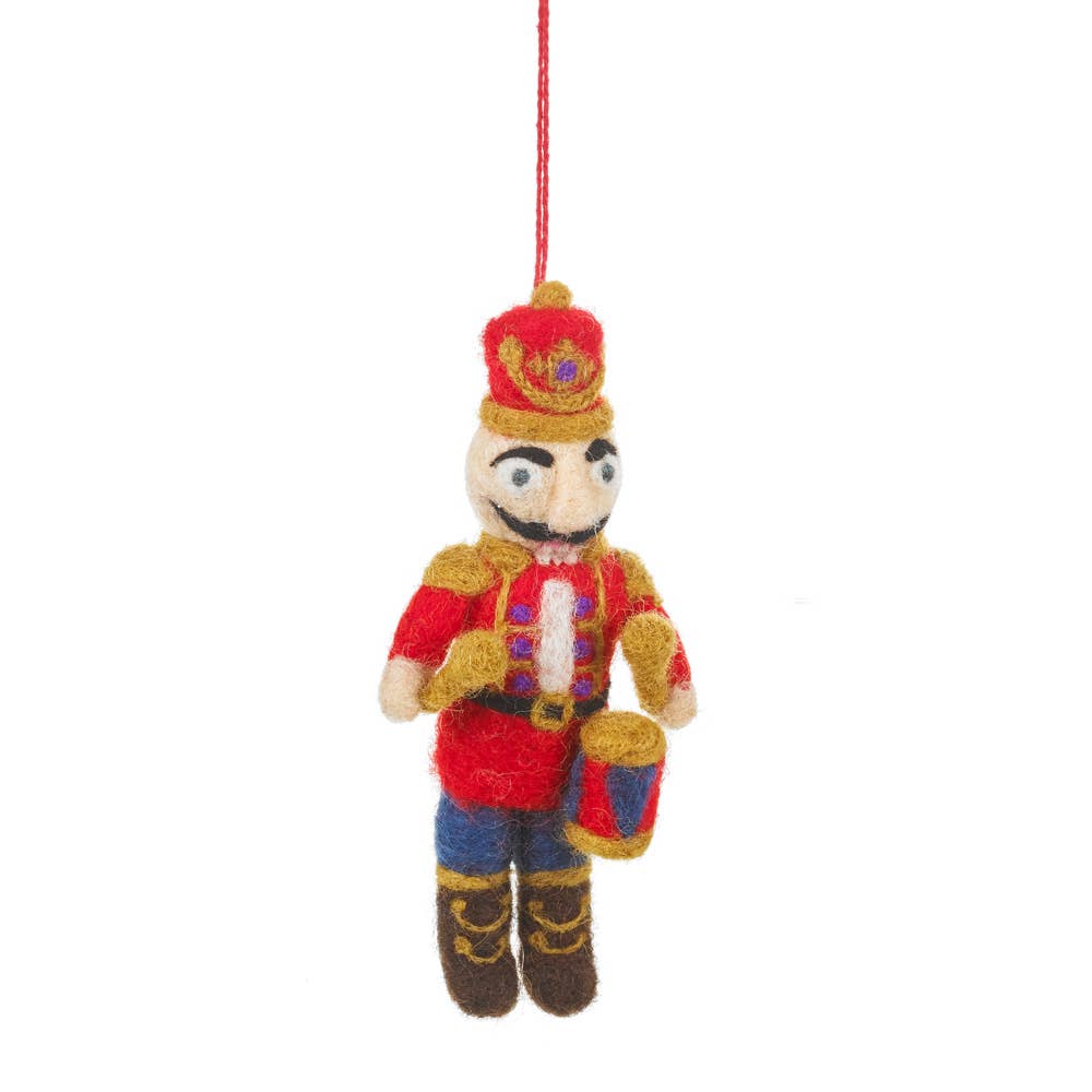 Handcrafted felt nutcracker hanging ornament made with natural cotton