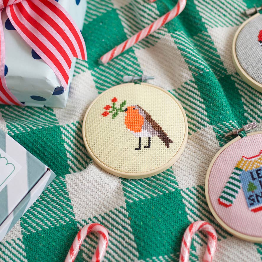 Contents of the eco-friendly Robin and Berry cross stitch kit