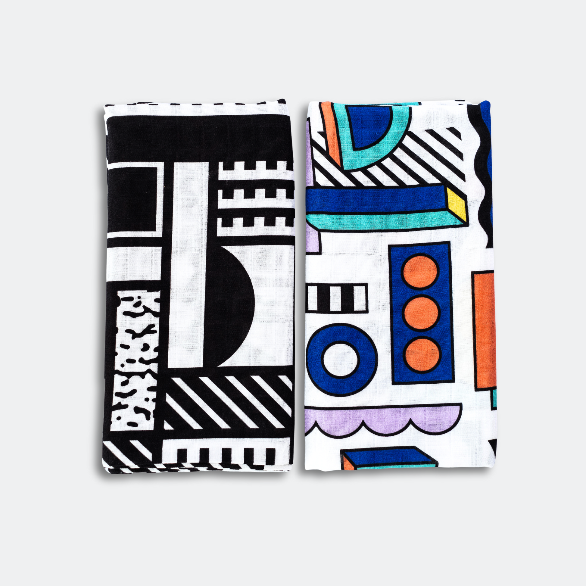 Pair of large sensory muslin squares featuring bold high-contrast designs by Camille Walala for Etta Loves, made from 100% organic cotton, suitable from 0–12 months.