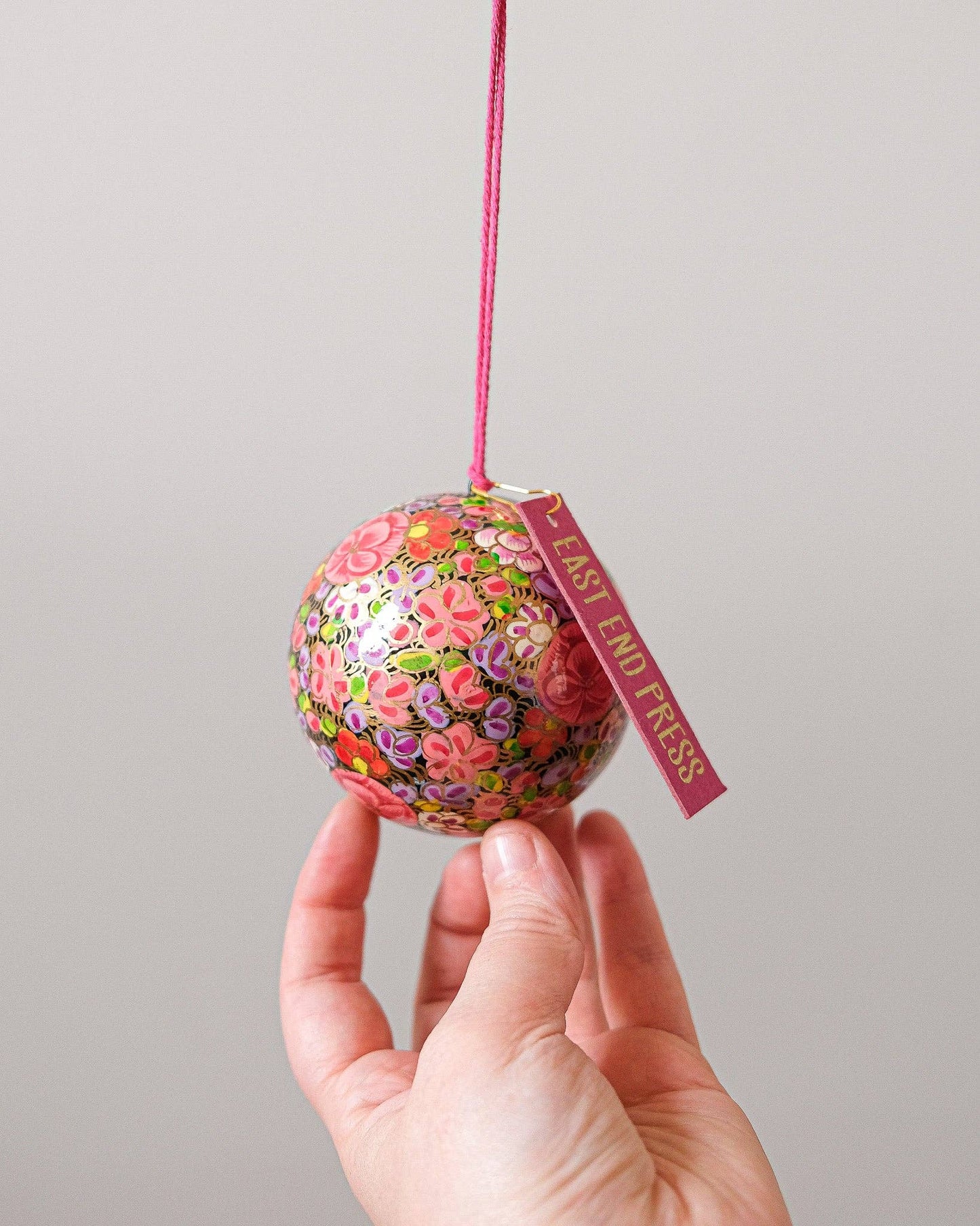 Gold Floret Papier Mâché Christmas Bauble adding eco-friendly elegance to a festive display.