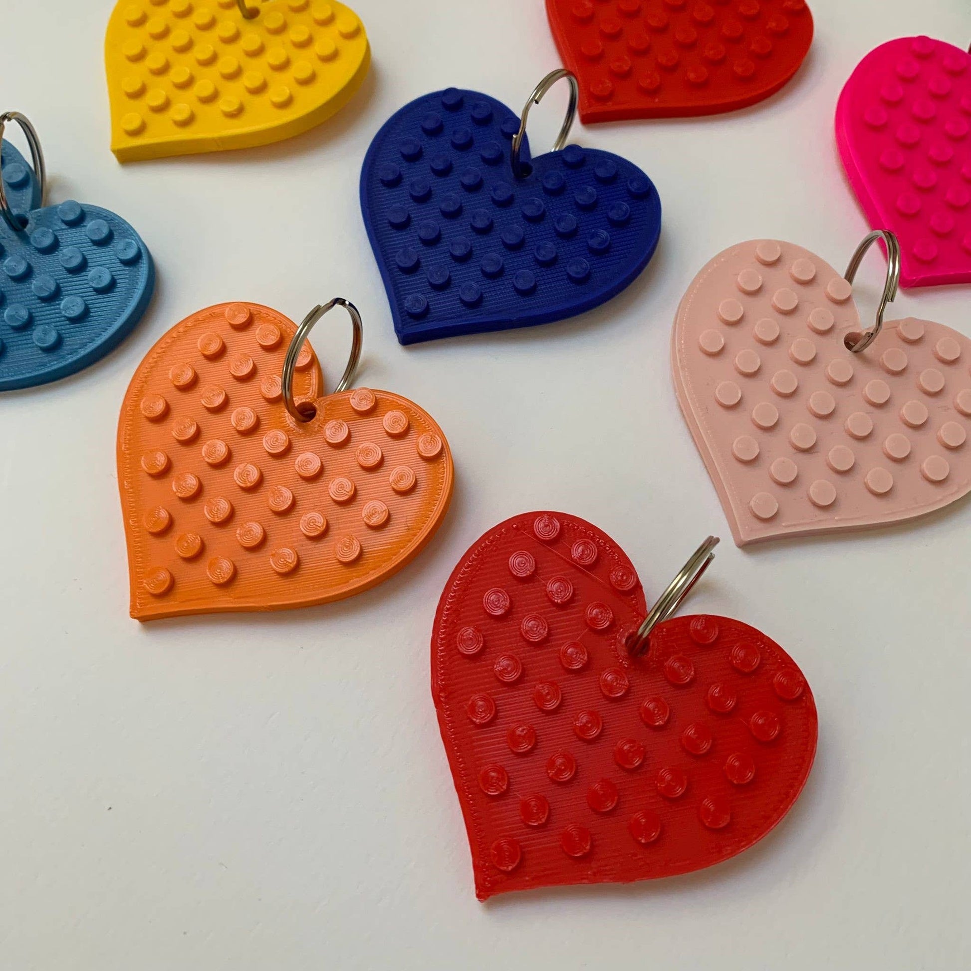 Rainbow assortment of biodegradable heart keyrings – perfect for gifting