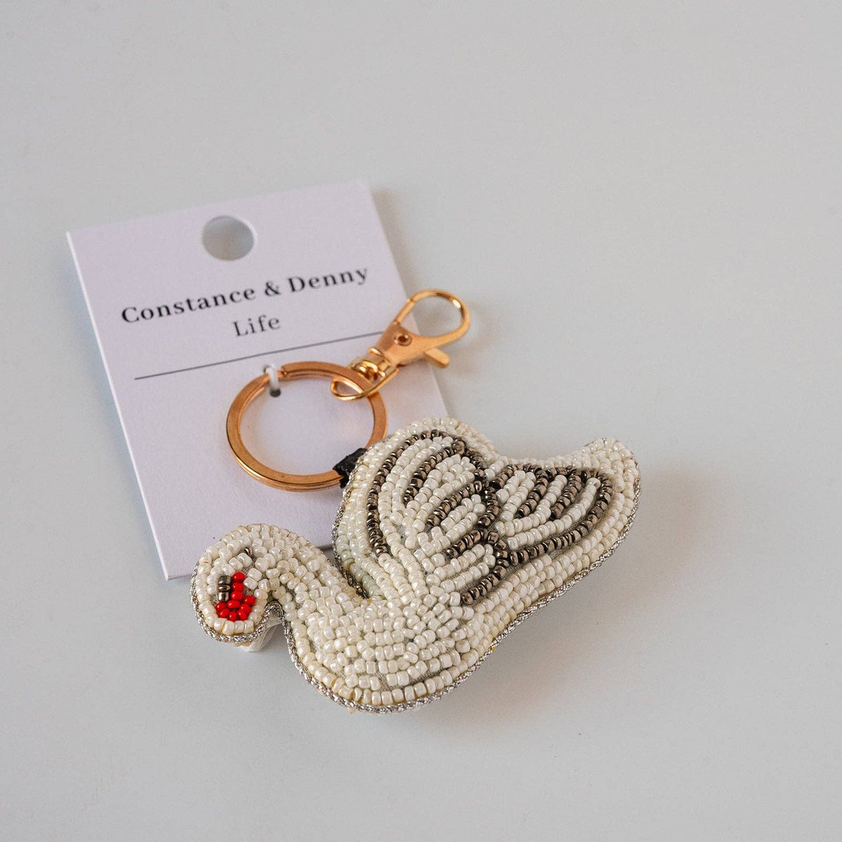 Artisan beadwork on handmade Curio keyring
