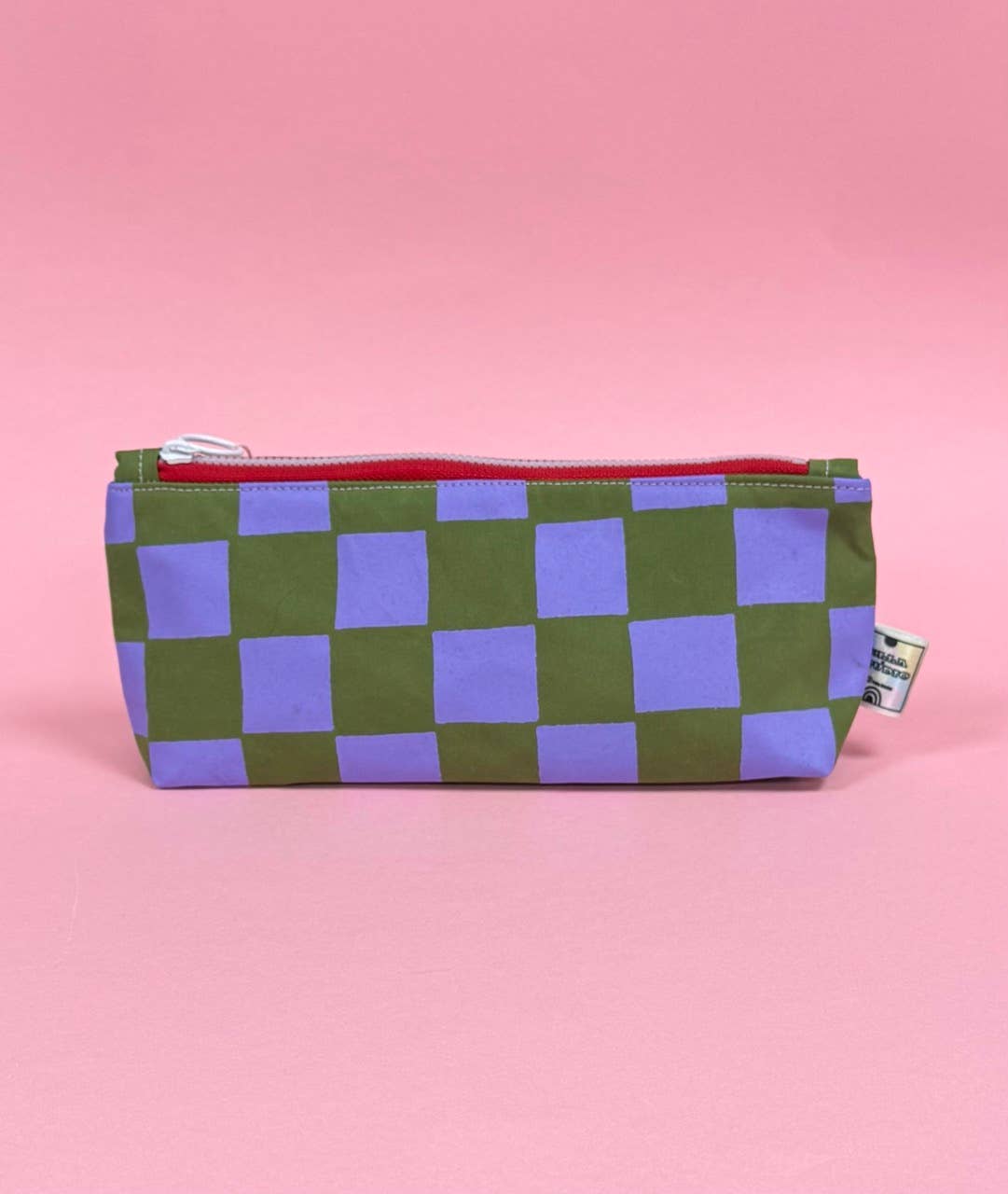 Artisanal handprinted design on waxed cotton pouch
