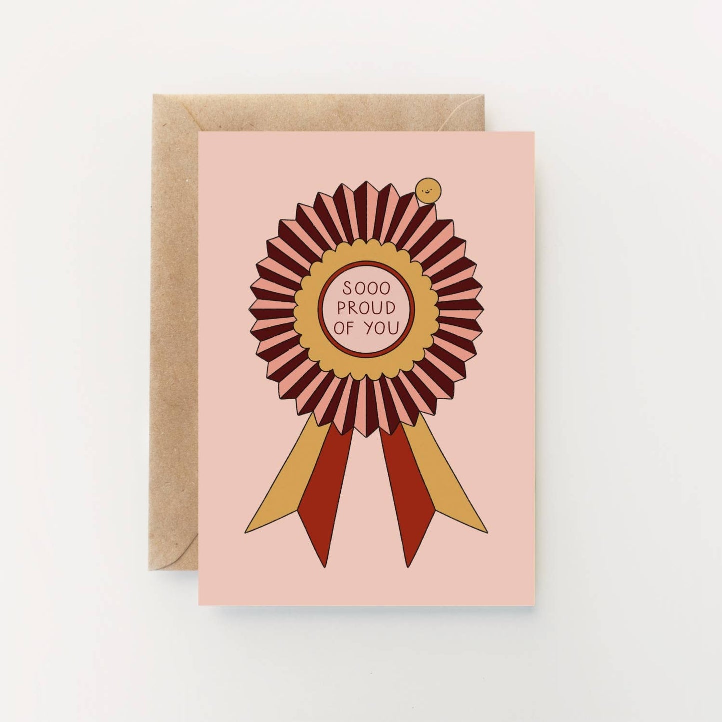 Greeting card with a ribbon design and 'SOOO PROUD OF YOU' text on a pink background. Illustrated “Sooo Proud of You” greetings card by Hollie Fuller, eco‑friendly UK‑made design