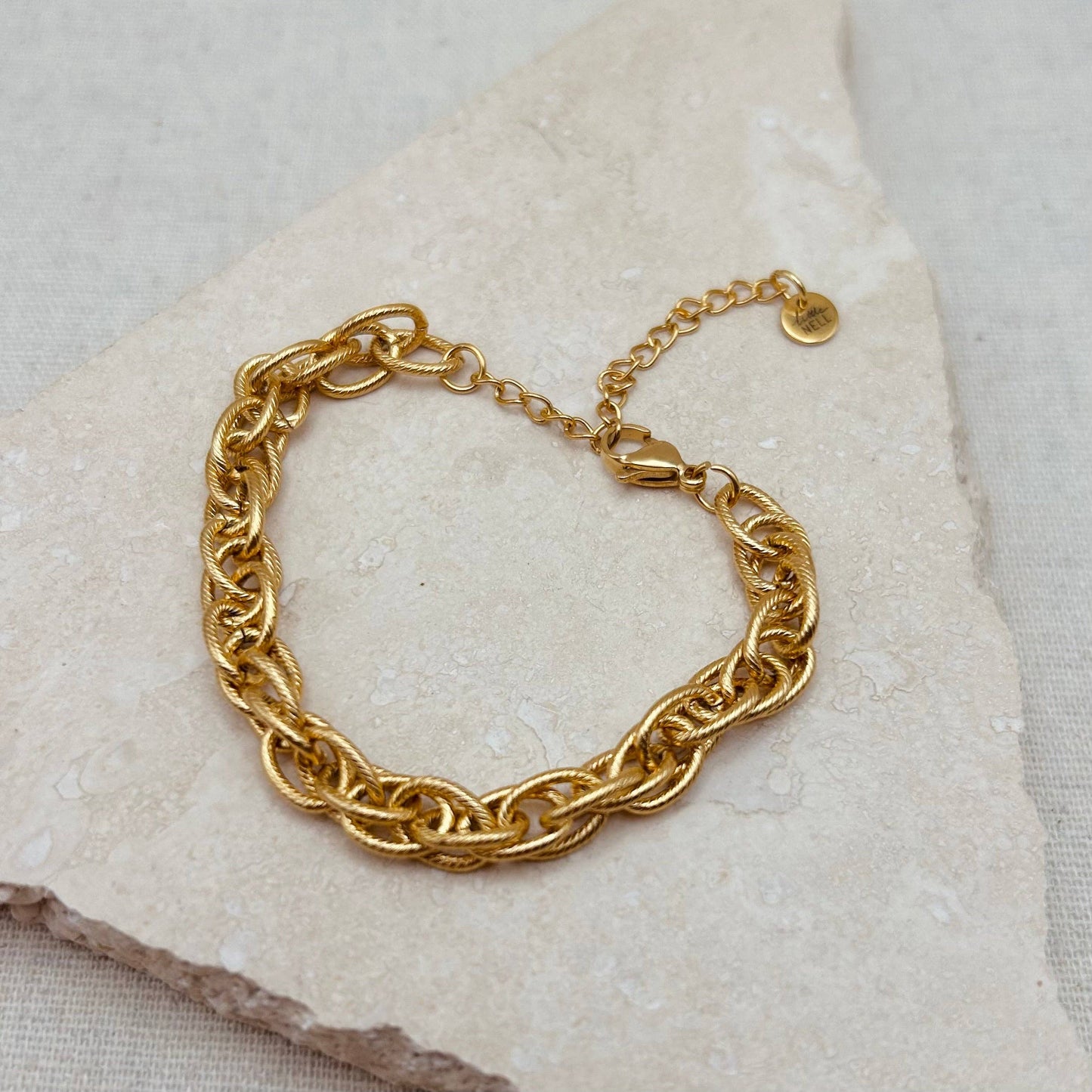 Close-up of Little Nell Gold Multi-link Bracelet showing textured links