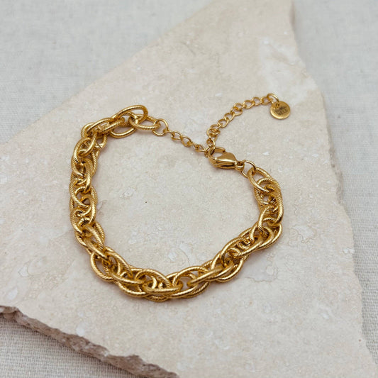 Close-up of Little Nell Gold Multi-link Bracelet showing textured links