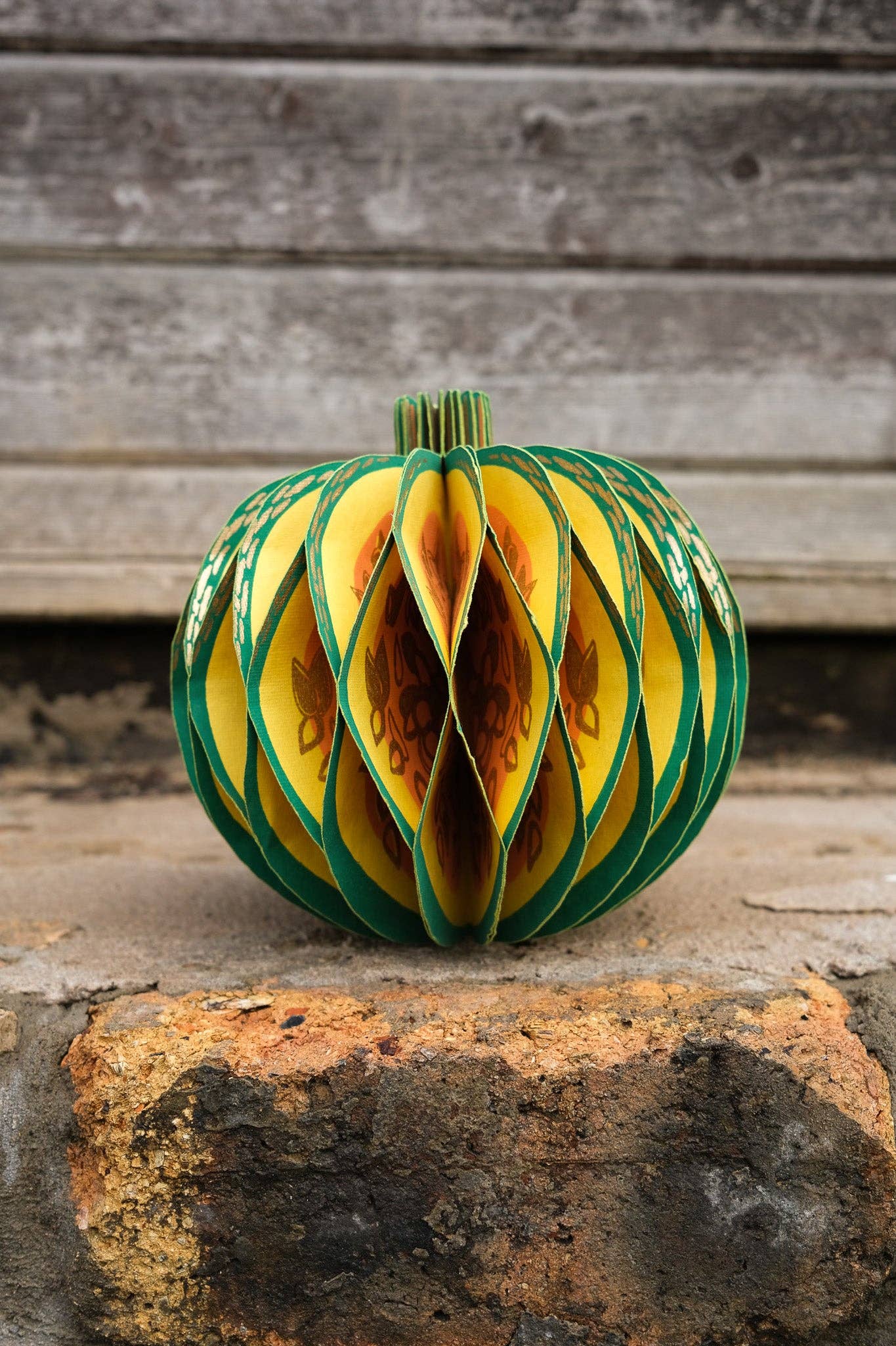 Recycled cotton paper gourd honeycomb decoration with cotton hanging loop, eco-friendly ornament.