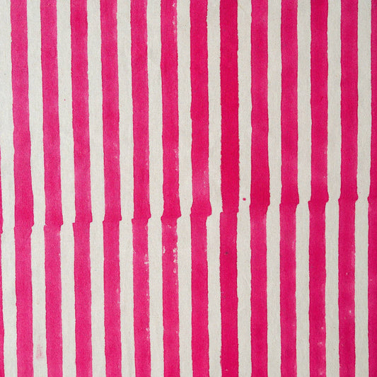 Close up of hand-block printed pink stripe pattern