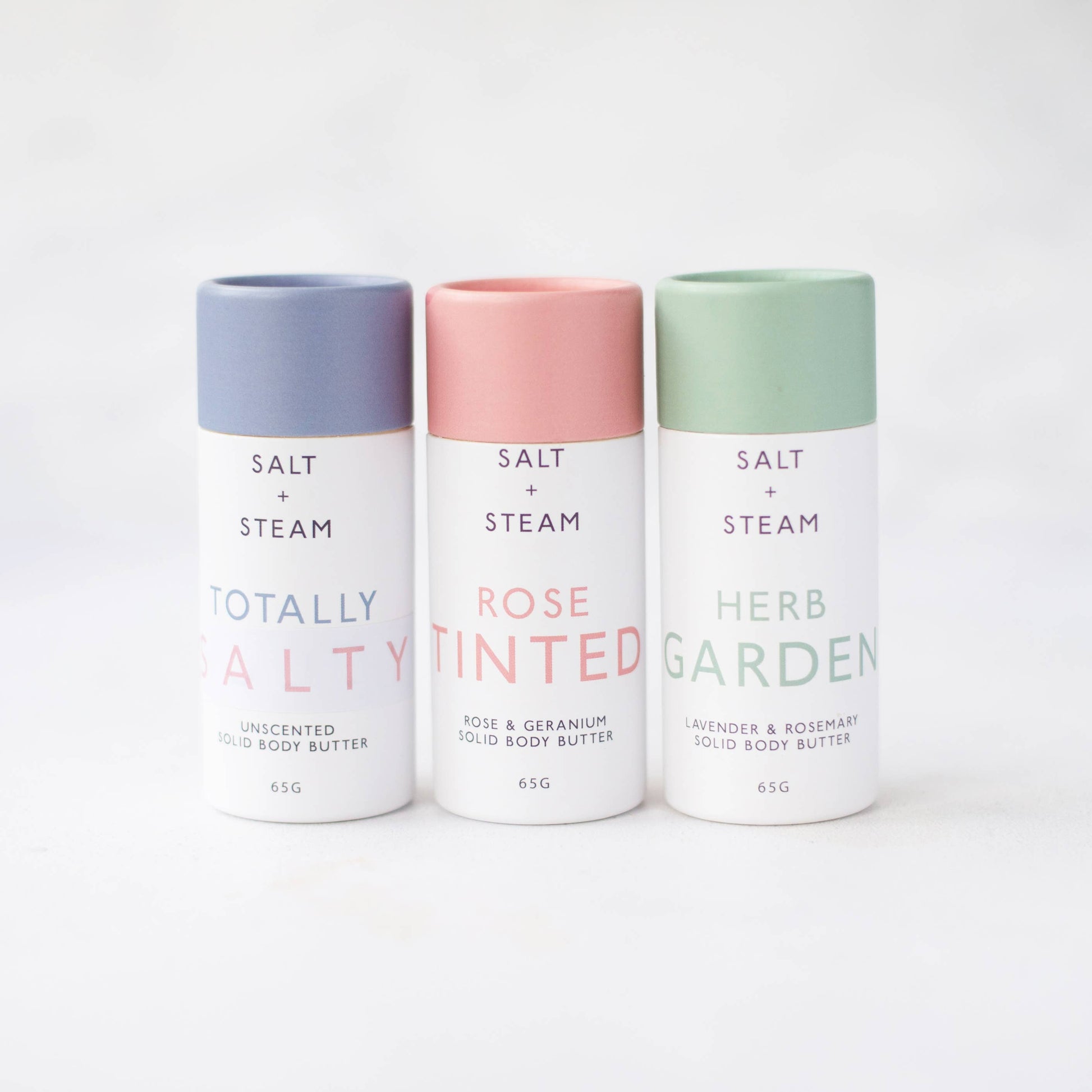 Herb Garden lavender rosemary solid body butter tube on eco-friendly background.