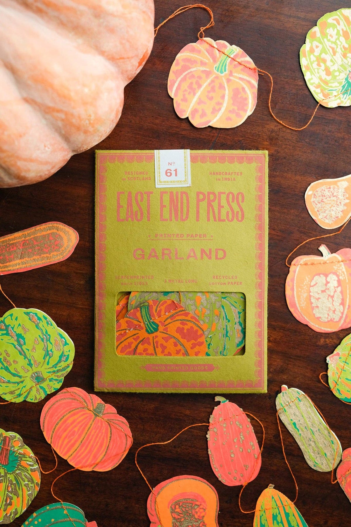 Eco-friendly pumpkin and squash paper garland close-up