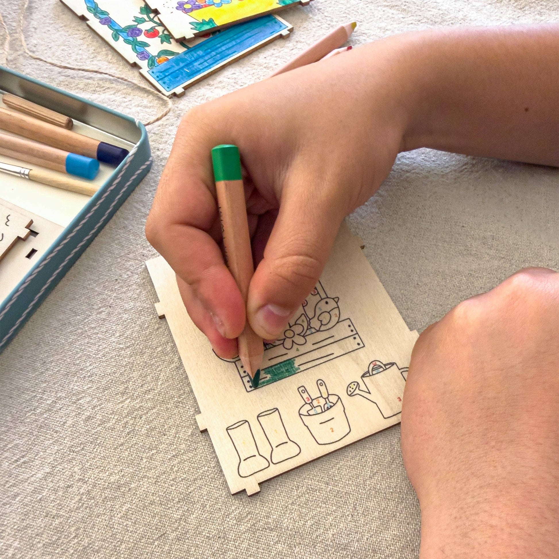 Eco-friendly kids craft kit packaging showing the completed bird house