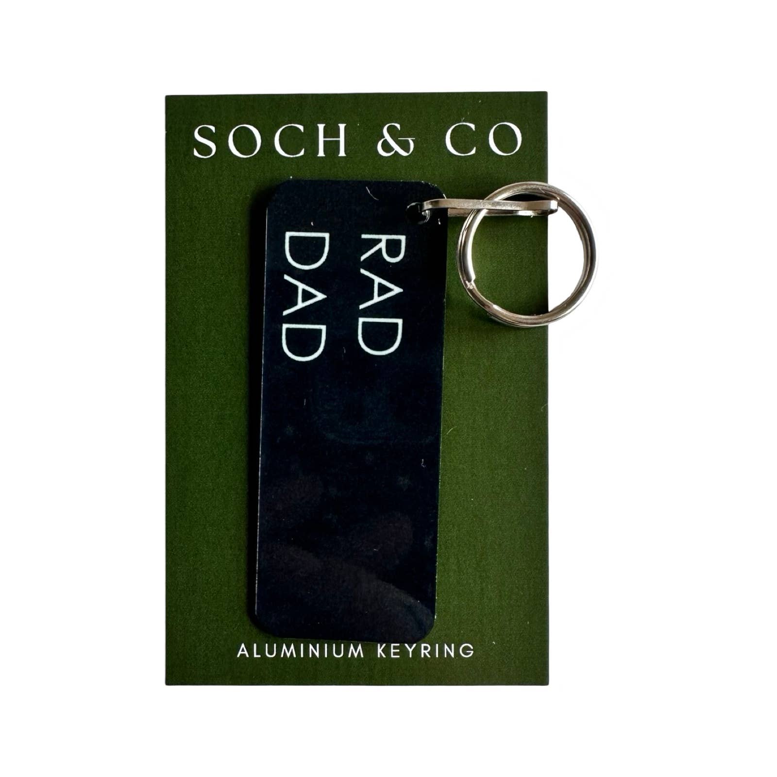 Soch &amp; Co's metal "RAD DAD" keyrings is the perfect Father's Day gift. Brushed steel reverse and a black printed front with white font with a silver keyring for easy use and display. Presented on a printed coloured mini card.