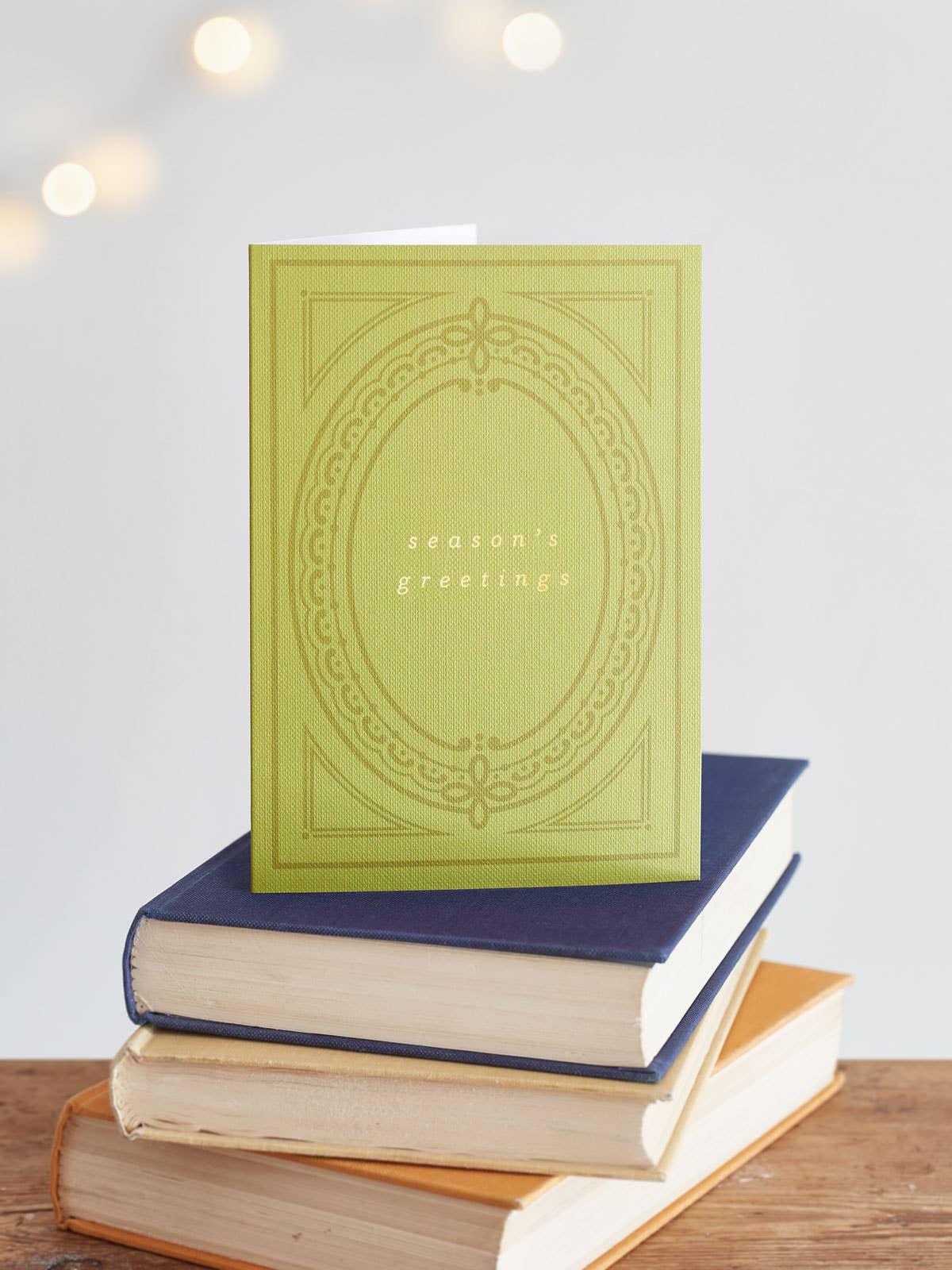 Book Club Vintage Christmas Card Pack of 5 by Another Loop, foil printed on 350gsm Buckram card, recycled Kraft envelopes, plastic-free, A6 size festive sustainability.