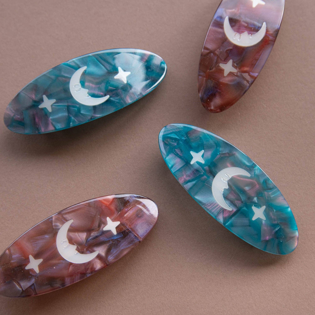 Close up of Night Sky barrette clip showing plant based cellulose acetate texture