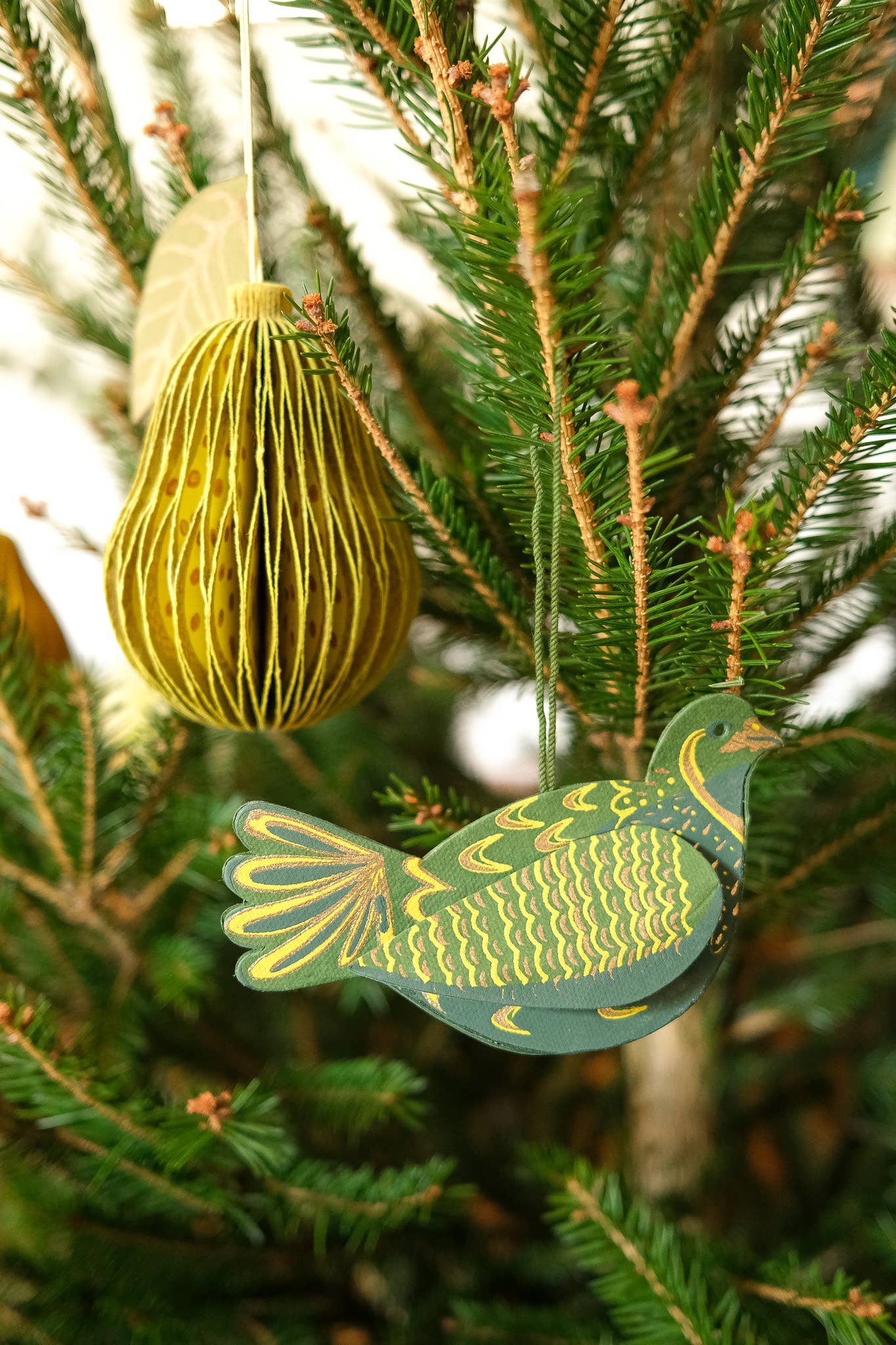 Pear honeycomb ornament hanging as a festive or autumn decoration
