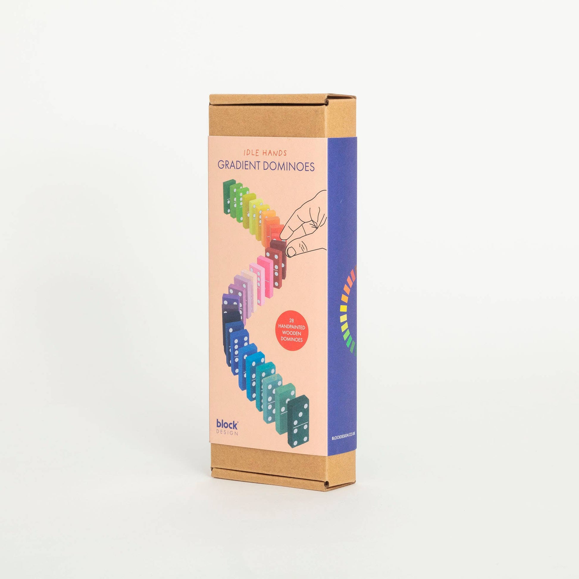 Box of gradient dominoes with colorful design on a white background