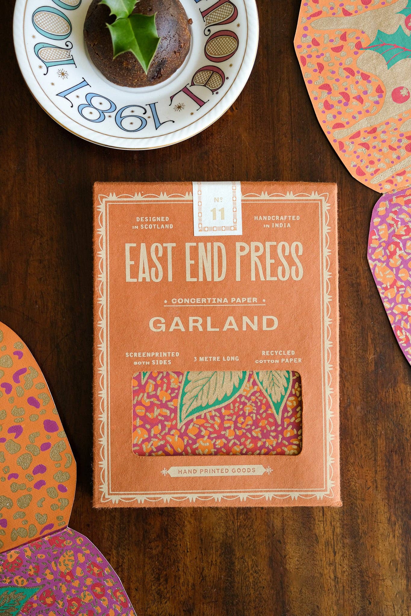 Hand-printed recycled paper Christmas Puddings Concertina Garland by East End Press, 3 metres long