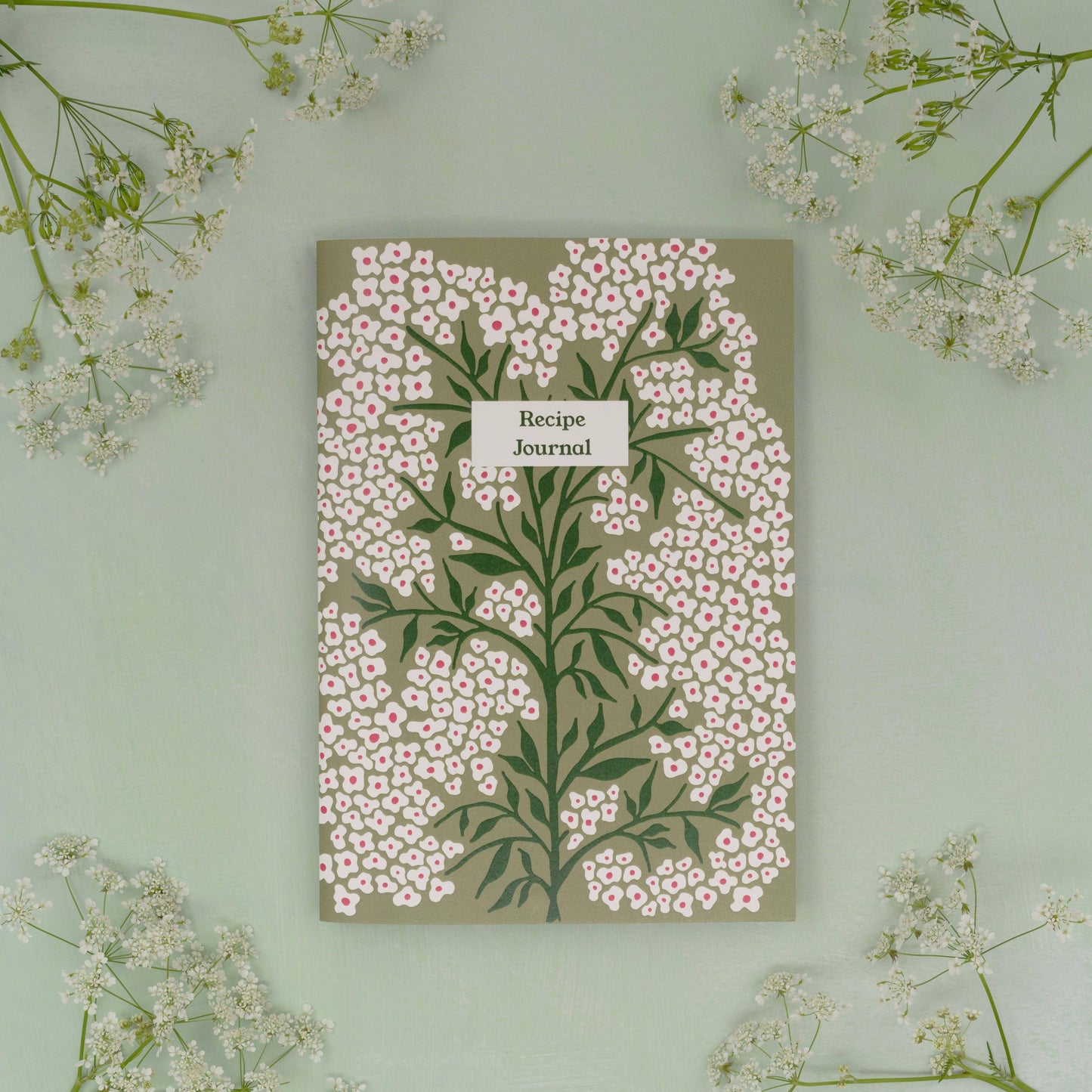 Pages are designed to layout ingredients and method as well as space to draw pictures, staple photos etc. Also includes a namesake page and handy weights and measurements page at the back. Supplied with Bookmark.