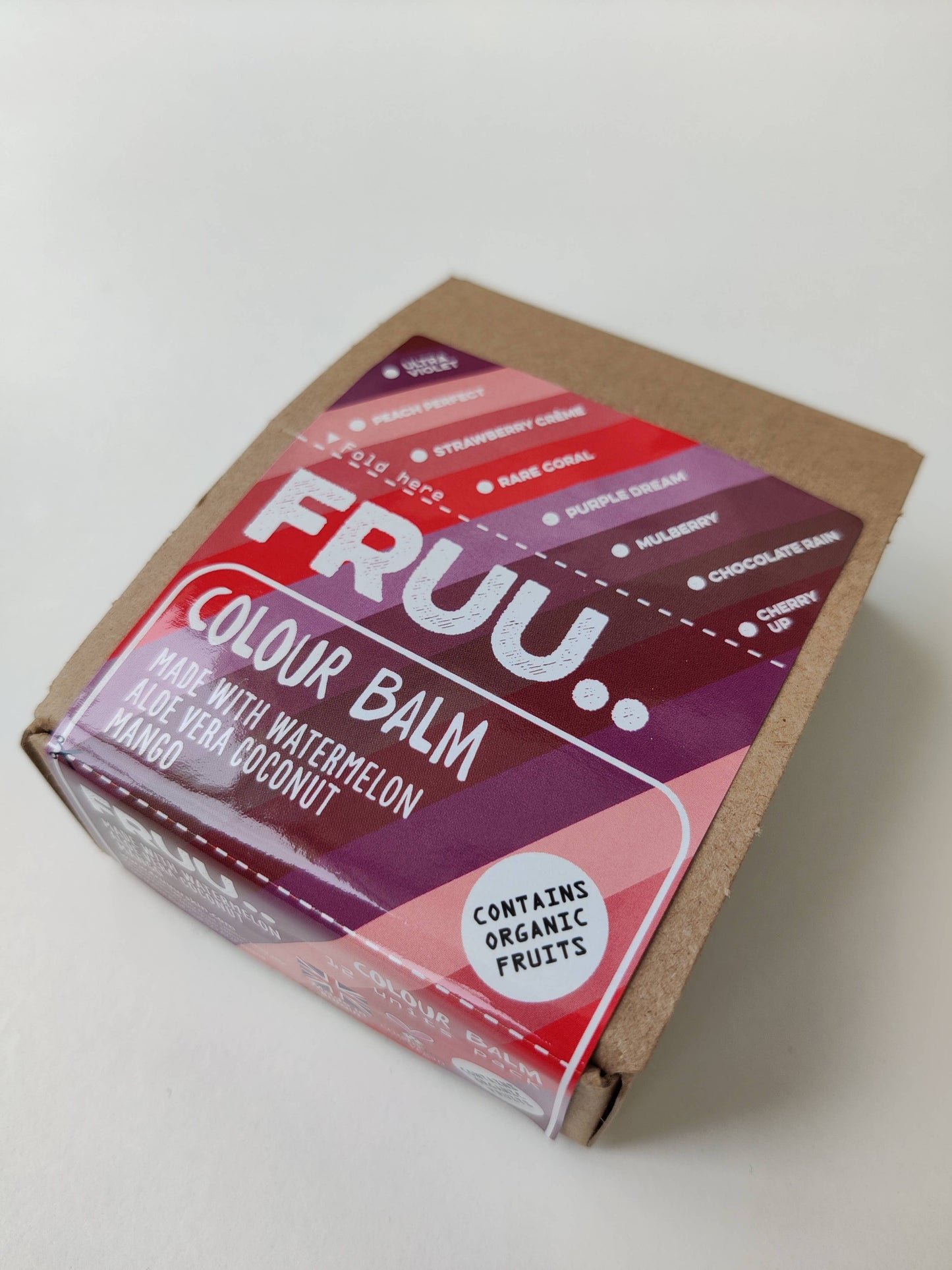 FRUU Rare Coral Tinted Lip Balm swatch on skin