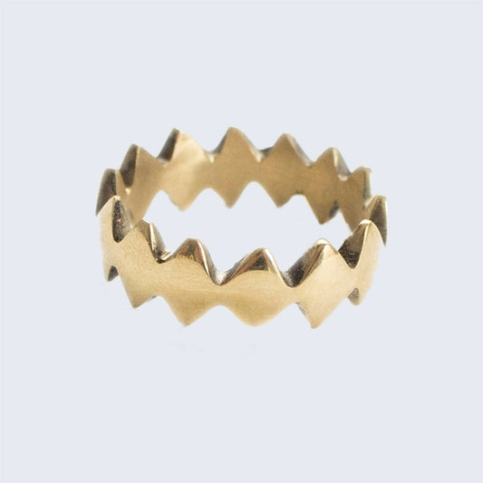 This lightening bolt inspired Sprite Ring made with highly polished hand-cast recycled brass. Ethically made in Kenya, brass ring in a zig zag pattern. 