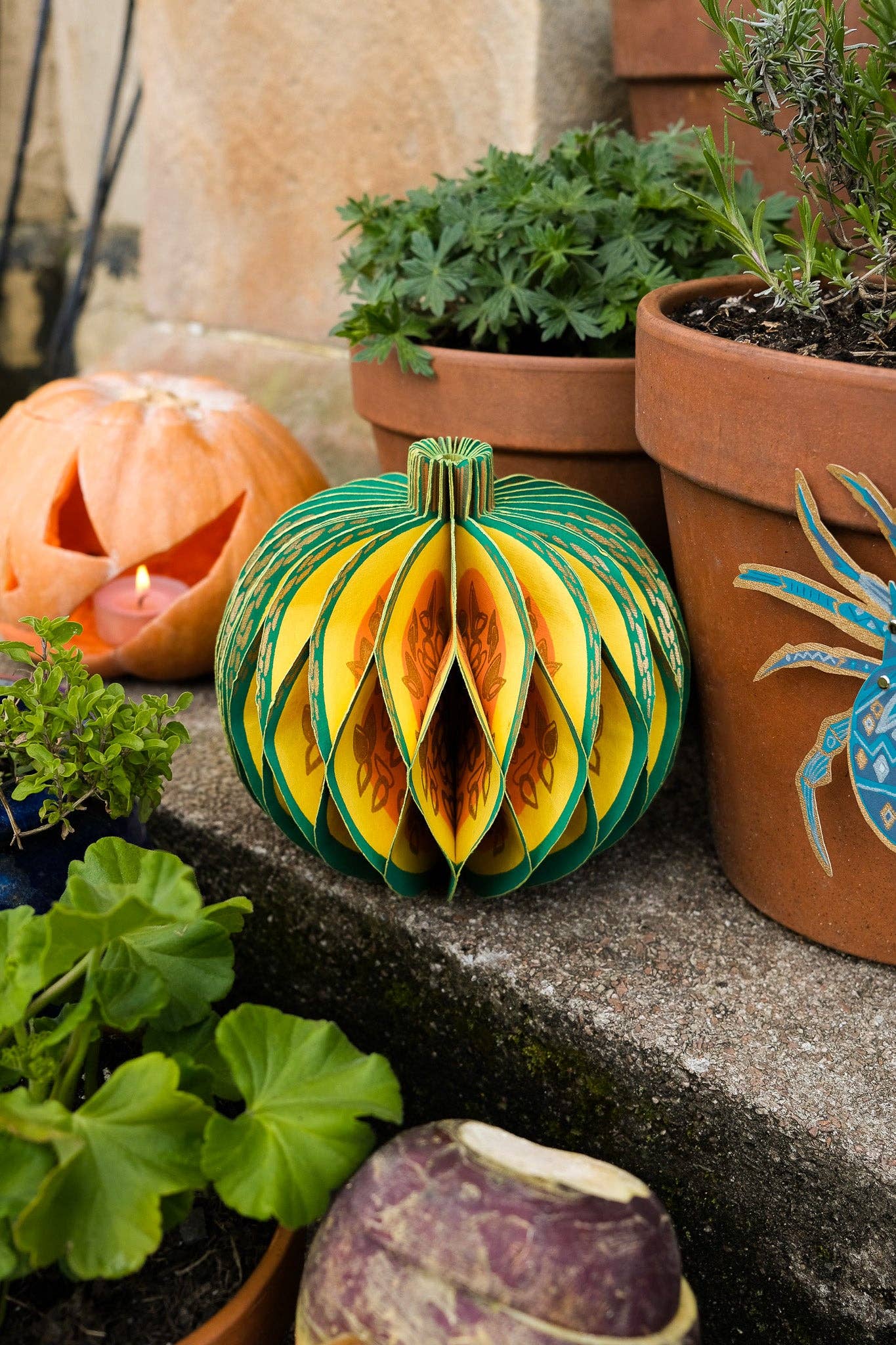 Recycled cotton paper gourd honeycomb decoration with cotton hanging loop, eco-friendly ornament.