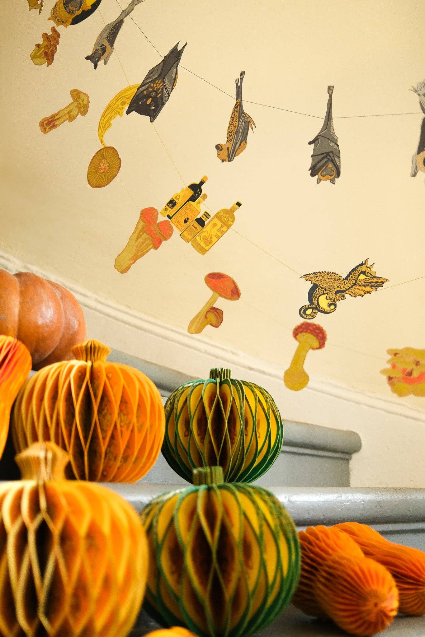 Recycled cotton paper gourd honeycomb decoration with cotton hanging loop, eco-friendly ornament.