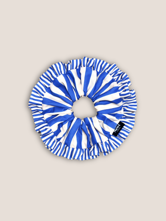 Oversized blue and white striped swirl scrunchie handmade from recycled plastic bottles