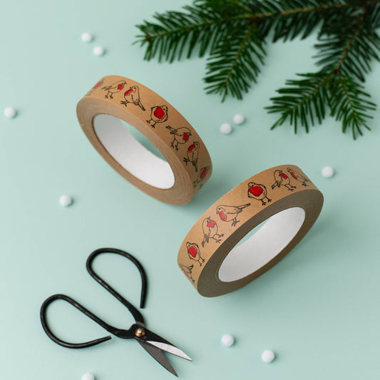 Close-up of Eco Robin Christmas Paper Tape showing easy hand-tear feature, ideal for quick and plastic-free festive gift wrapping.