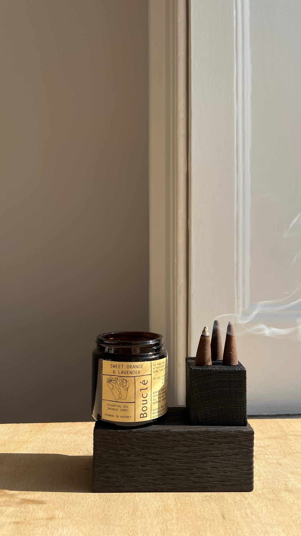 Eco-friendly sweet orange and lavender incense cones in jar