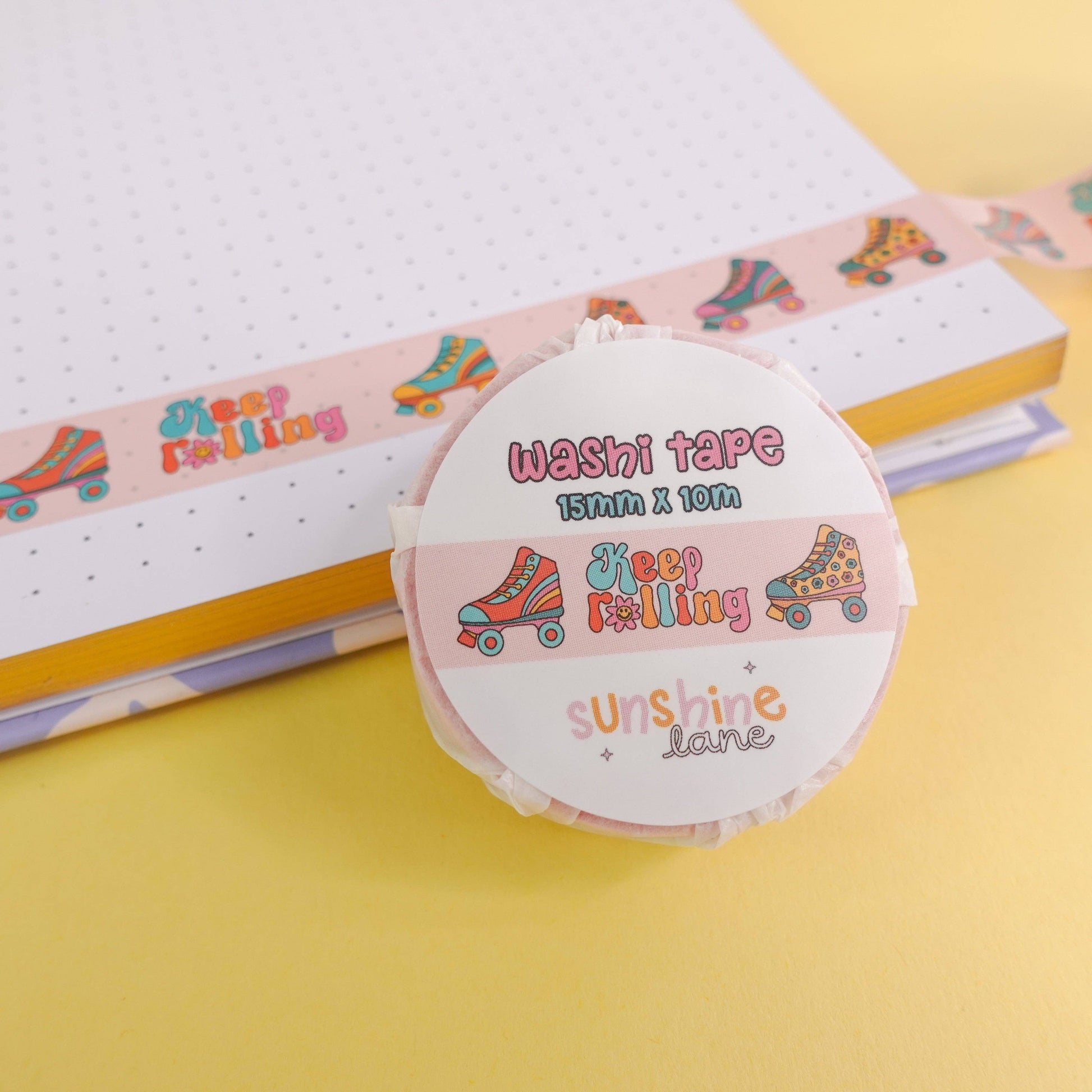 Funky washi tape with roller skate design and “Keep Rolling” message, 15mm x 10m roll, wrapped in eco-friendly paper—perfect for creative stationery and craft projects.