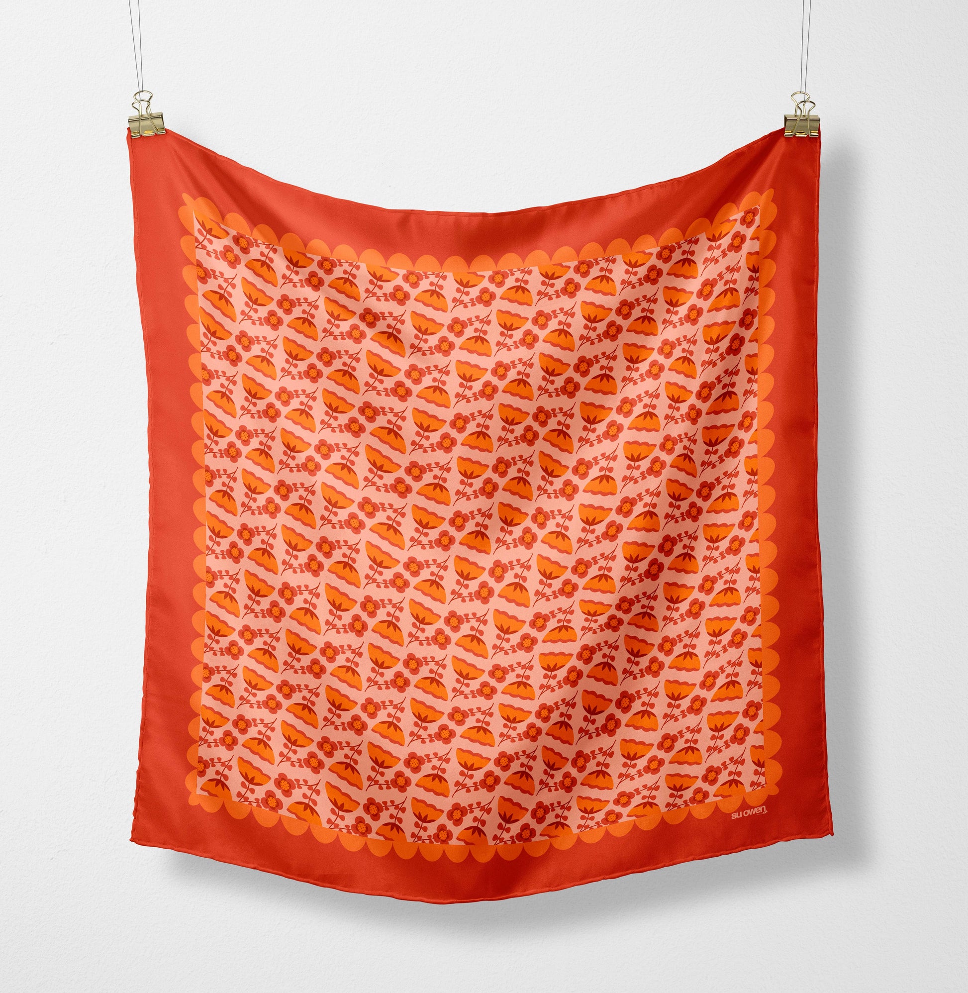 Eco silk twill pocket square with orange folk flower pattern and scalloped border, cottagecore style. Made from recycled polyester and designed by Su Owen.