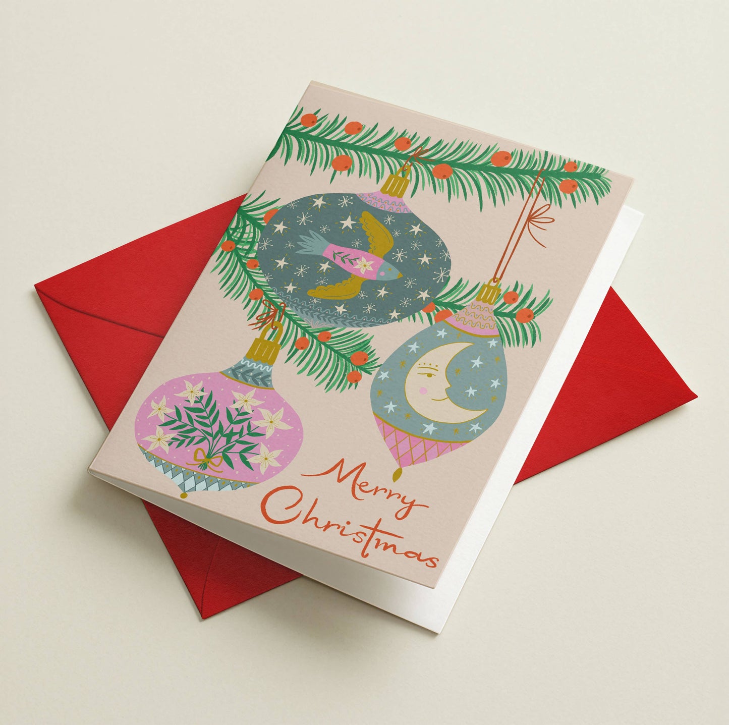 Pastel patterned Christmas bauble card with red envelope