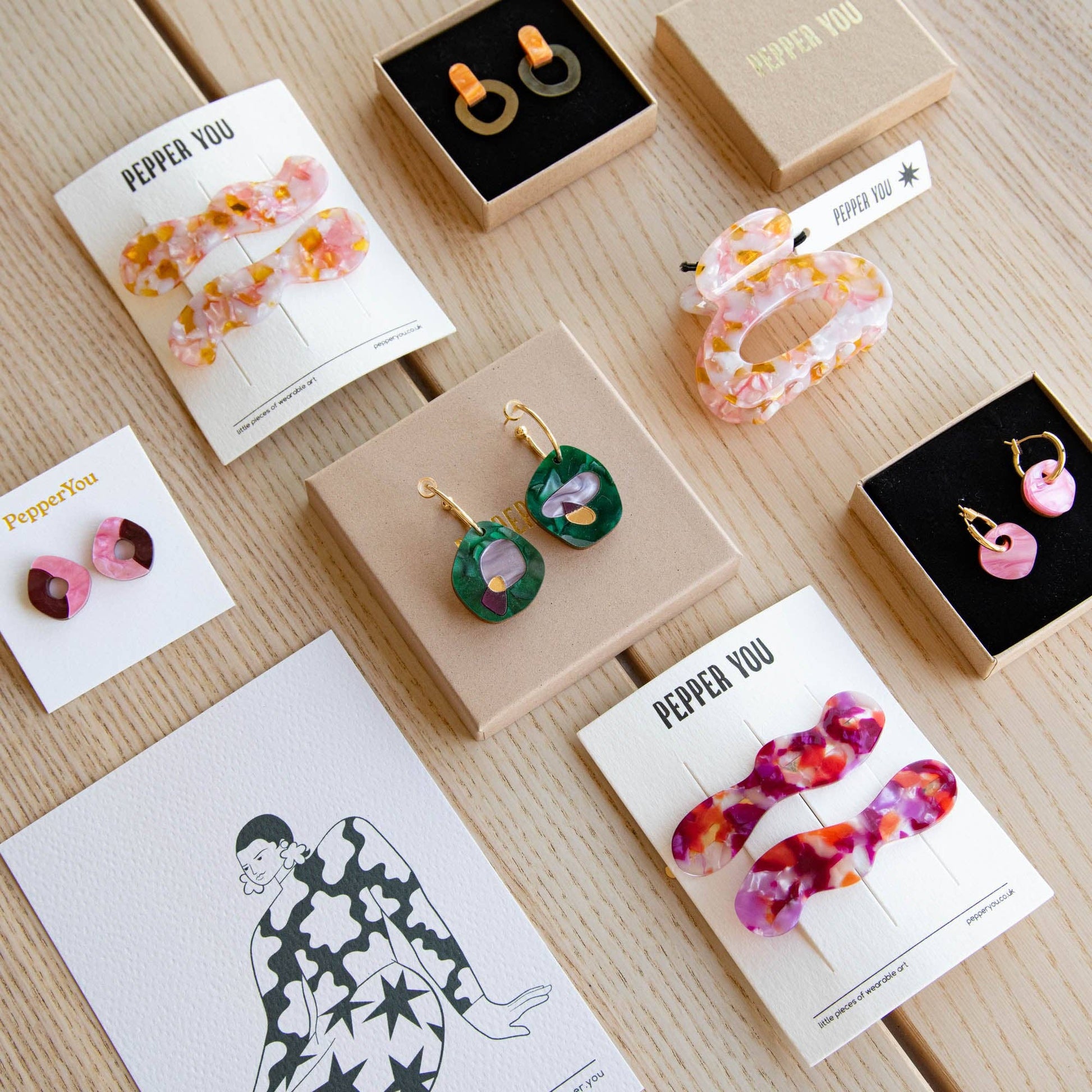 Close up of berry hair clip detail