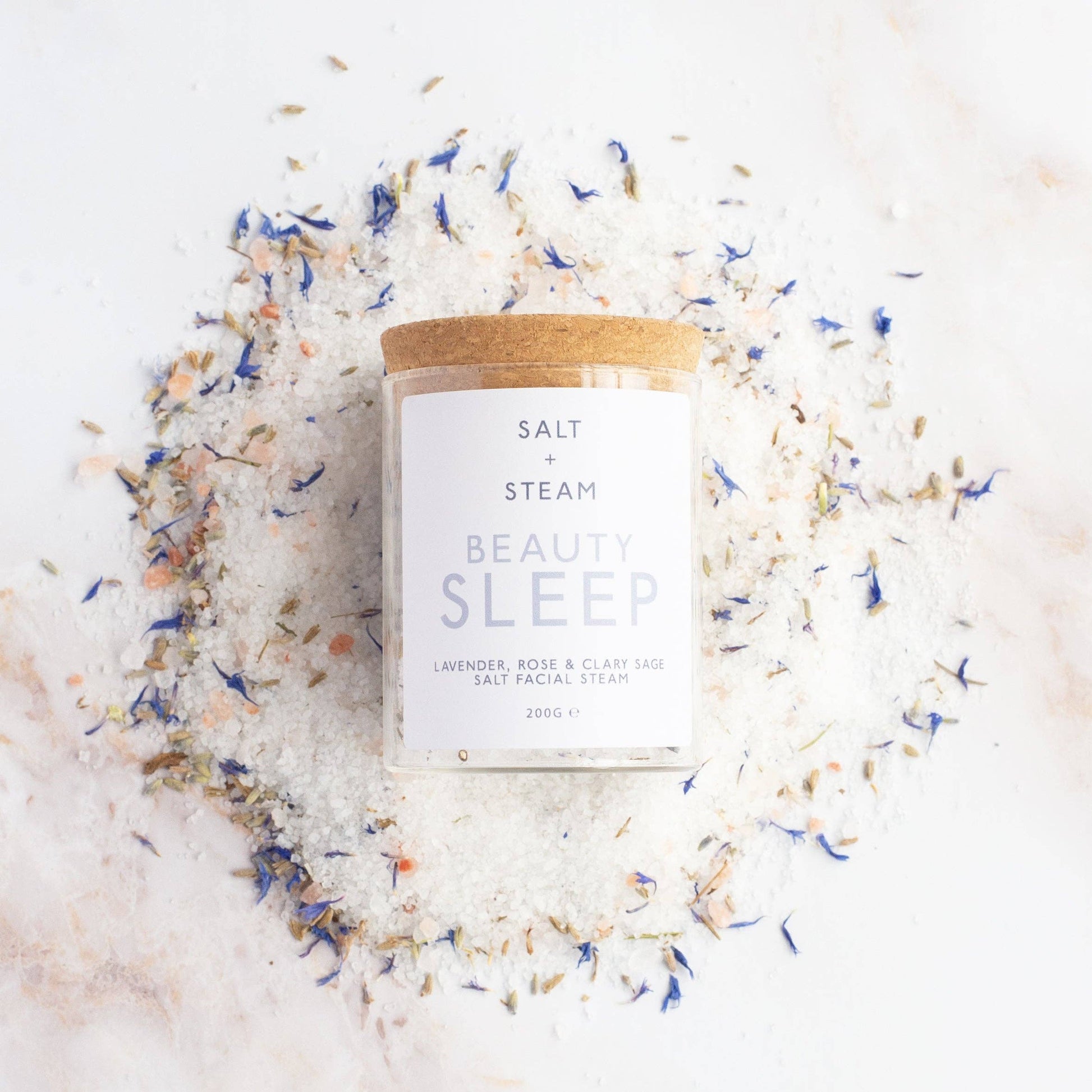 Plant-based floral steam with lavender, rose, clary sage in plastic-free packaging.