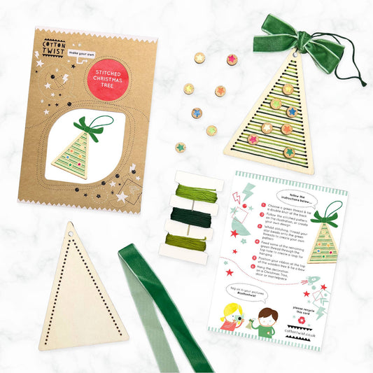 Cotton Twist stitched Christmas tree decoration kit with sustainably certified wooden tree base and cotton thread