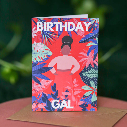 Diverse birthday card featuring a Black girl and vibrant green plants