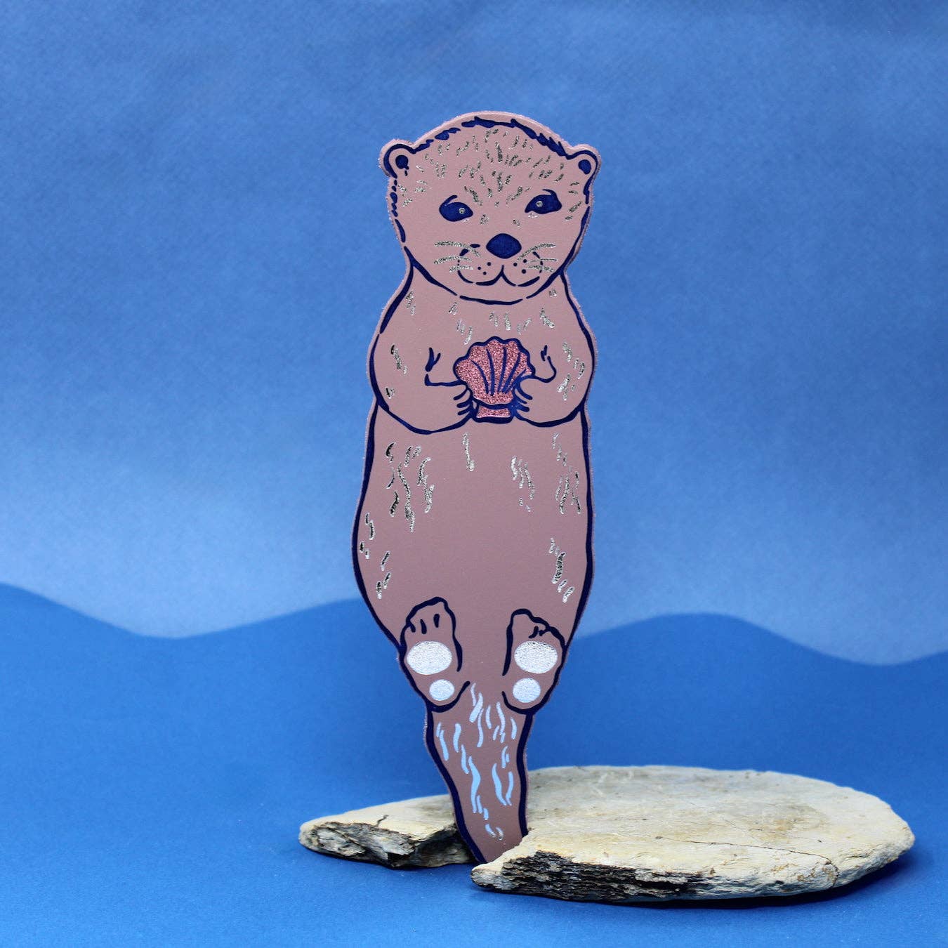 Handmade leather otter bookmark, embossed with Otterly Relaxed, British made by Ark Colour Design.