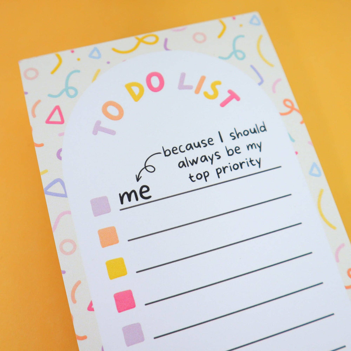 DL size daily planner notepad with colourful abstract pattern