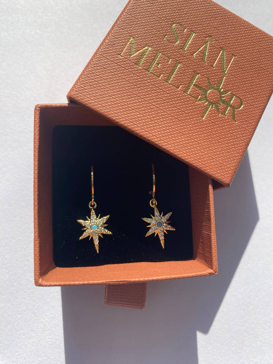 Gold star huggie hoop earrings with turquoise centre