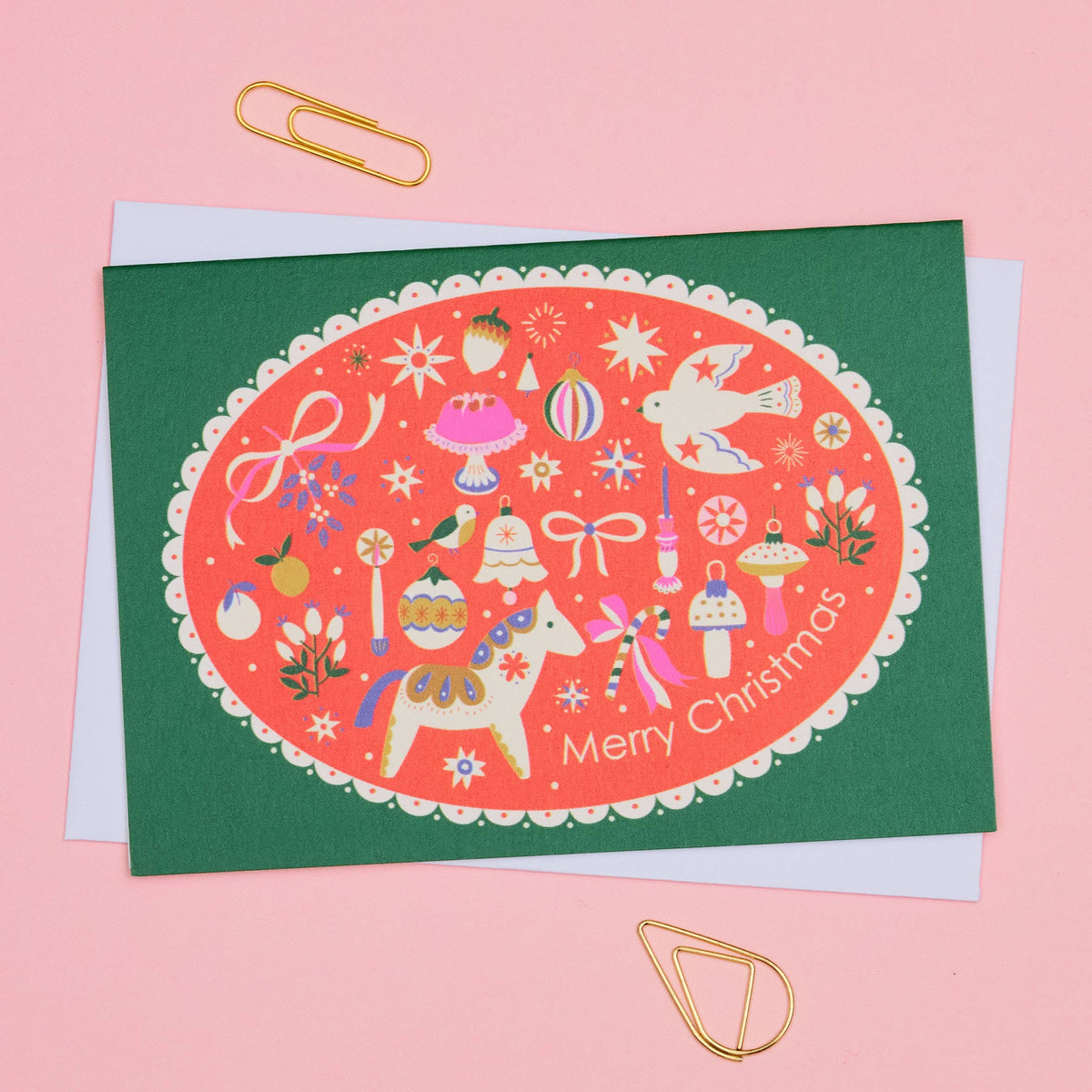 Close up of colourful festive bird illustration on Christmas card