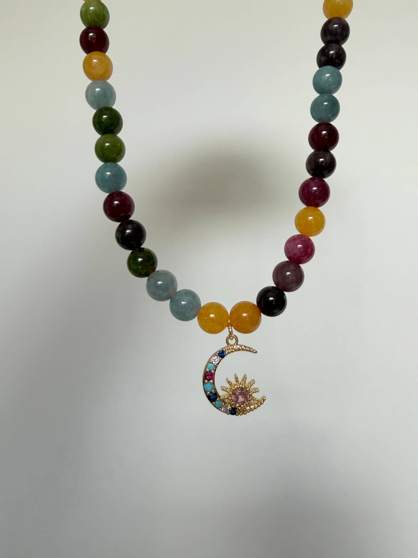 Large multicoloured tourmaline beaded necklace with gold moon charm